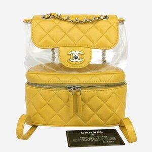 AUTHENTIC Chanel yellow crinkle leather and PVC Mini Backpack